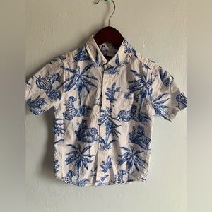 White button down shirt with blue design.